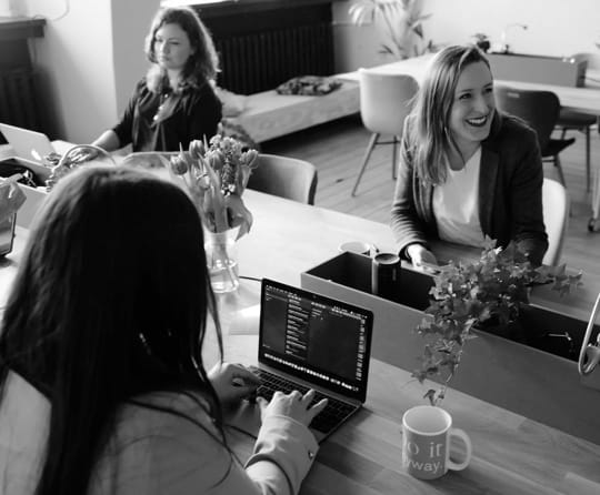 Three females at an office